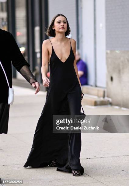 Guest is seen wearing a black dress and black bag outside The Blonds show during NYFW S/S 2024 on September 13, 2023 in New York City.