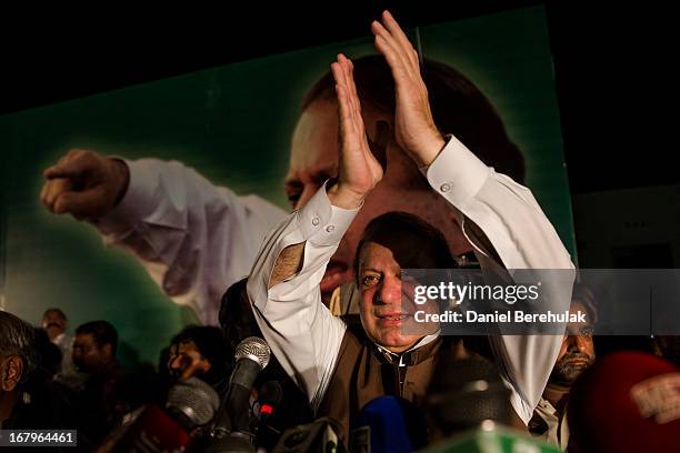 Nawaz Sharif, leader of political party Pakistan Muslim League-N , addresses supporters during an election campaign rally on May 03, 2013 in Multan,...