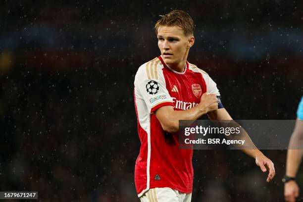 Martin Odegaard of Arsenal looks on during the UEFA Champions League Group B match between Arsenal and PSV at Emirates Stadion on September 20, 2023...