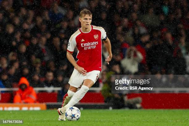 Martin Odegaard of Arsenal in action during the UEFA Champions League Group B match between Arsenal and PSV at Emirates Stadion on September 20, 2023...
