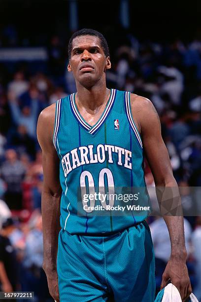 Robert Parish of the Charlotte Hornets walks against the Sacramento Kings during a game played on March 29, 1996 at Arco Arena in Sacramento,...