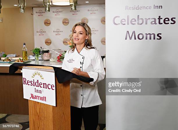 Chef and lifestyle entrepreneur Cat Cora receives the 2013 Resident Mom of the Year award at Residence Inn by Marriott on May 3, 2013 in New York...