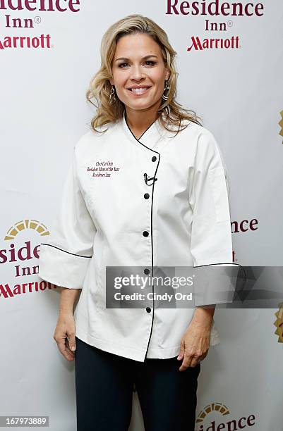 Chef and lifestyle entrepreneur Cat Cora receives the 2013 Resident Mom of the Year award at Residence Inn by Marriott on May 3, 2013 in New York...