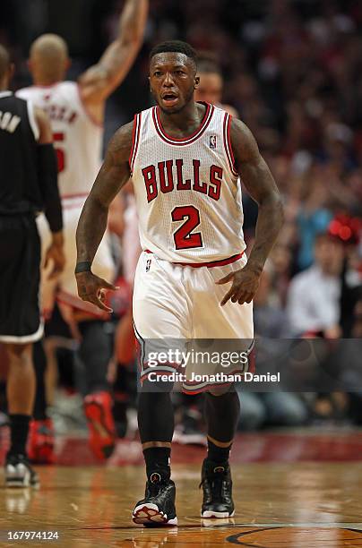 Nate Robinson of the Chicago Bulls reacts after hitting a shot against the Brooklyn Nets in Game Six of the Eastern Conference Quarterfinals during...