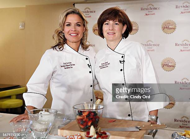 Award recipient, chef and lifestyle entrepreneur Cat Cora poses with Residence Inn by Marriott VP and Global Brand Manager, Diane Mayer at the 2013...