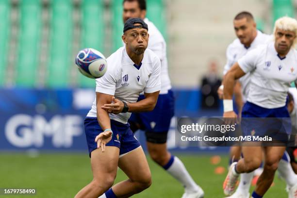 Christian Leali'ifano of Samoa passes the ball during their captains run ahead of their Rugby World Cup France 2023 match against Argentina at Stade...