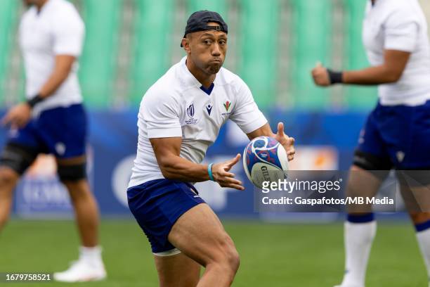 Christian Leali'ifano of Samoa passes the ball during their captains run ahead of their Rugby World Cup France 2023 match against Argentina at Stade...