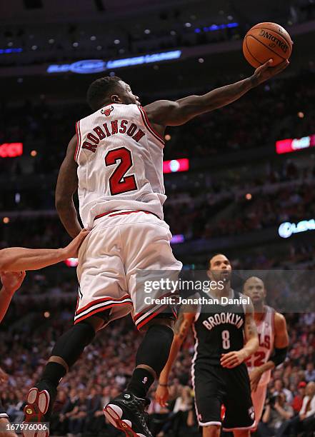 Nate Robinson of the Chicago Bulls drives against the Brooklyn Nets in Game Six of the Eastern Conference Quarterfinals during the 2013 NBA Playoffs...