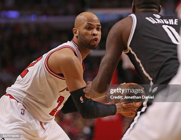 Taj Gibson of the Chicago Bulls looks to pass against the Brooklyn Nets in Game Six of the Eastern Conference Quarterfinals during the 2013 NBA...