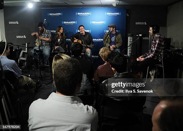 Musician/comedian Stephen Lynch performs on Raw Dog Comedy with host Mark Seman in the SiriusXM studios on May 3, 2013 in New York City.