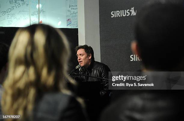 Musician/comedian Stephen Lynch performs on Raw Dog Comedy with host Mark Seman in the SiriusXM studios on May 3, 2013 in New York City.