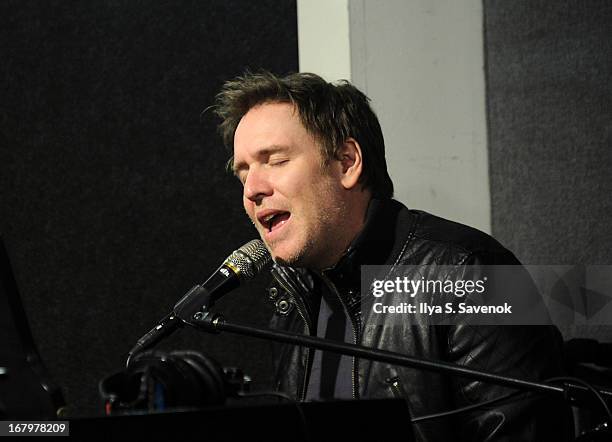 Musician/comedian Stephen Lynch performs on Raw Dog Comedy with host Mark Seman in the SiriusXM studios on May 3, 2013 in New York City.