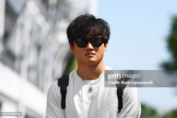 Yuki Tsunoda of Japan and Scuderia AlphaTauri walks in the Paddock during previews ahead of the F1 Grand Prix of Singapore at Marina Bay Street...