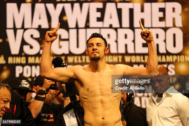 Robert Guerrero weighs in at 147 pounds for his fight against Floyd Mayweather for the WBC and Vacant Ring Magazine Welterweight titles at the MGM...