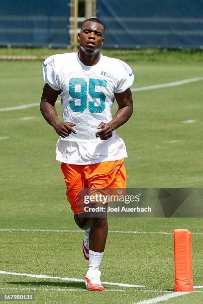 Dion Jordan of the Miami Dolphins runs during the rookie camp on May 3, 2013 at the Miami Dolphins training facility in Davie, Florida.