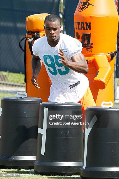 Dion Jordan of the Miami Dolphins works out during the rookie camp on May 3, 2013 at the Miami Dolphins training facility in Davie, Florida.