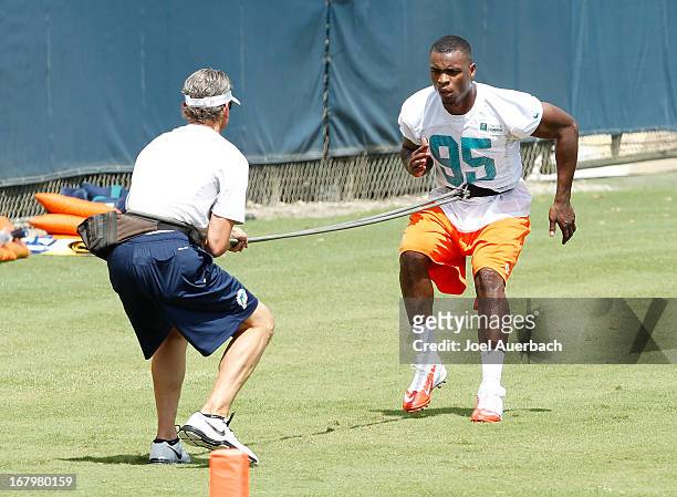 Dion Jordan of the Miami Dolphins works out during the rookie camp on May 3, 2013 at the Miami Dolphins training facility in Davie, Florida.
