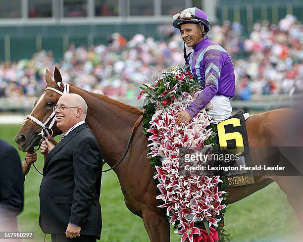 Owner Ed Stanco leads the way into the Winners Circle as Princess of Sylmar, with Mike Smith up, captures the 139th running of the Kentucky Oaks on...