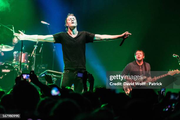 Dan Reynolds and Ben McKee from Imagine Dragons perform at Le Bataclan on May 3, 2013 in Paris, France.