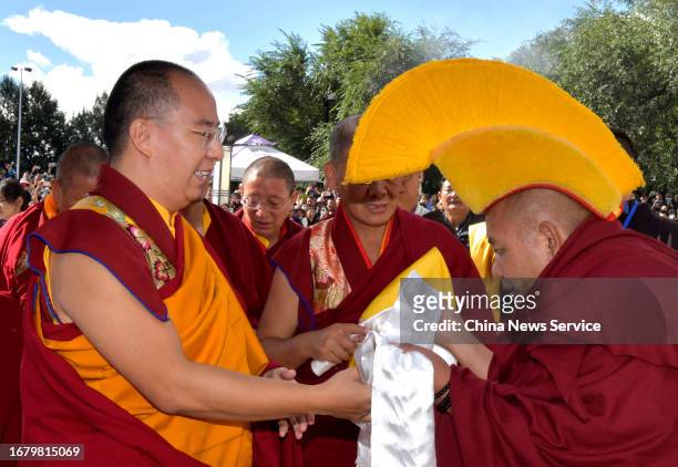 The 11th Panchen Lama Bainqen Erdini Qoigyijabu greets Tibetan monks at the Tashilhunpo Monastery, the traditional seat of the Panchen Lama lineage,...