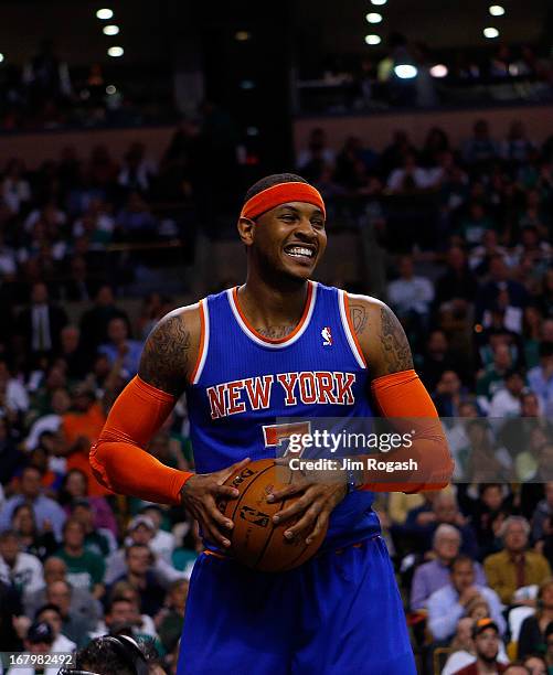 Carmelo Anthony of the New York Knicks react against the Boston Celtics during Game Six of the Eastern Conference Quarterfinals of the 2013 NBA...