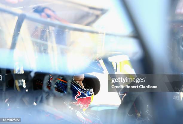 Casey Stoner driver of the Red Bull Pirtek Holden sits in his car during the qualifying session for round two of the V8 Supercars Dunlop Development...