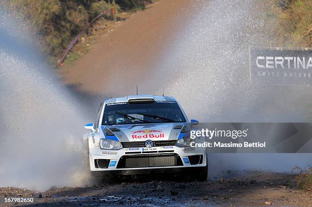 Sebastien Ogier of France and Julien Ingrassia of France compete in their Volkswagen Motorsport Polo R WRC during Day Two of the WRC Argentina on may...