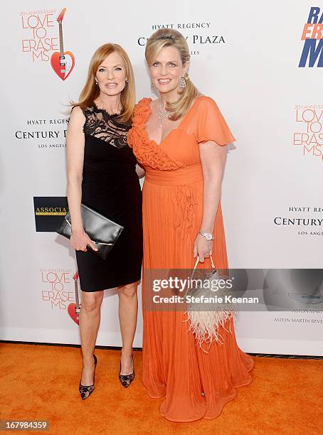 Actress Marg Helgenberger and host Nancy Davis attend the 20th Annual Race To Erase MS Gala "Love To Erase MS" at the Hyatt Regency Century Plaza on...