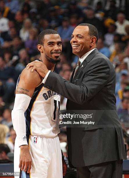 Head Coach Lionel Hollins of the Memphis Grizzlies shares a laugh with Mike Conley while playing the Los Angeles Clippers in Game Six of the Western...