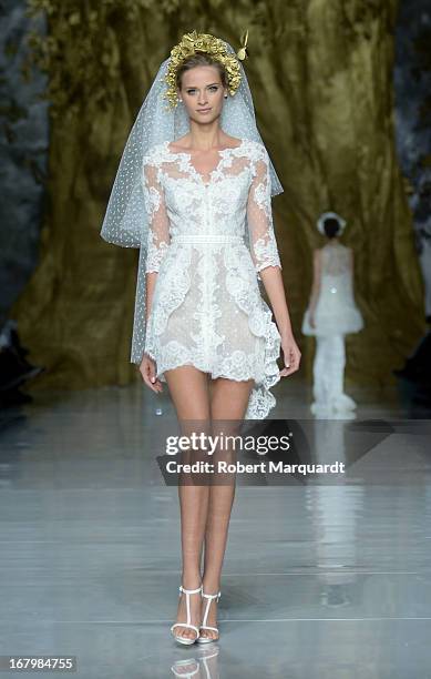 Model walks the runway for the Pronovias bridal fashion show during Barcelona Bridal Week 2013 on May 3, 2013 in Barcelona, Spain.