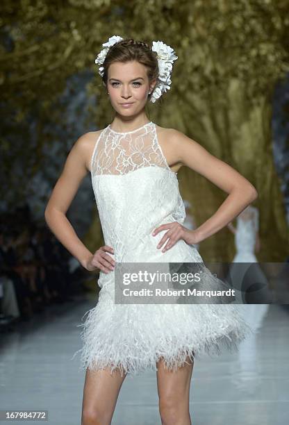 Model walks the runway for the Pronovias bridal fashion show during Barcelona Bridal Week 2013 on May 3, 2013 in Barcelona, Spain.