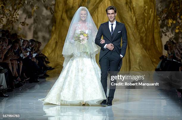 Anne Vyalitsyna and Jon Kortajarena walk the runway for the Pronovias bridal fashion show during Barcelona Bridal Week 2013 on May 3, 2013 in...
