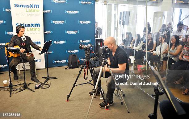 Spanish singer/songwriter Alejandro Sanz visits the SiriusXM studios for "SiriusXM's ICONOS" on May 3, 2013 in New York City.