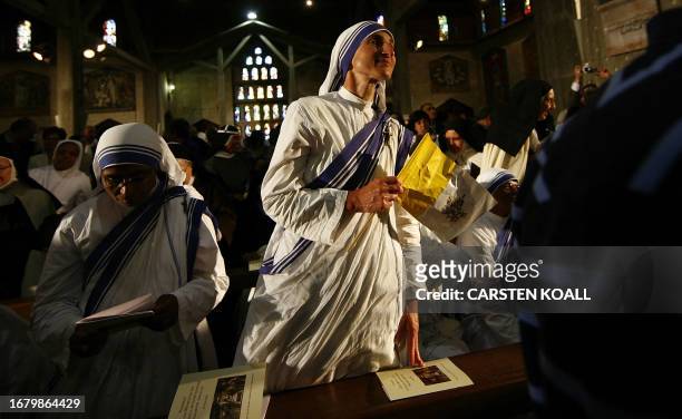 Nuns and pilgrims attend a mass led by Pope Benedict XVI at the Church of the Annunciation, believed to stand at the site of Mary's house where angel...