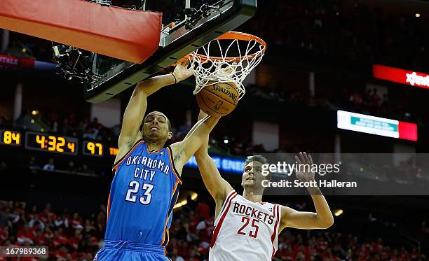 Kevin Martin of the Oklahoma City Thunder dunks against Chandler Parsons of the Houston Rockets in Game Six of the Western Conference Quarterfinals...