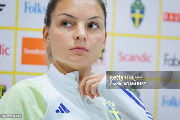Sweden's women's national soccer team player Johanna Rytting Kaneryd listens during a press conference in Gothenburg, Sweden, on September 21 on the...