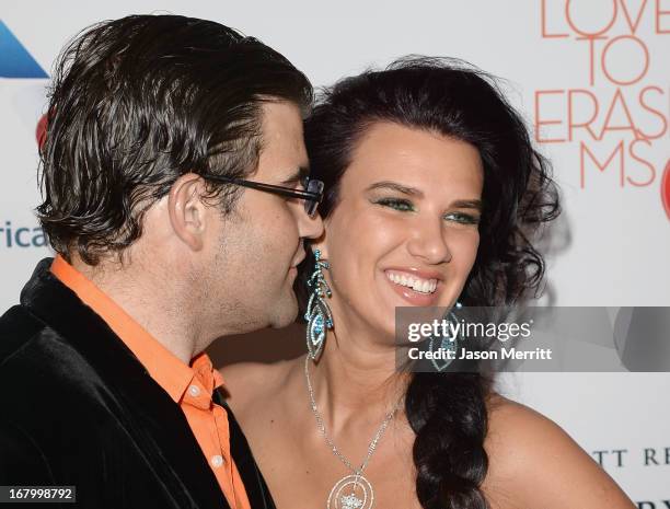 Jason Davis and guest attend the 20th Annual Race To Erase MS Gala "Love To Erase MS" at the Hyatt Regency Century Plaza on May 3, 2013 in Century...