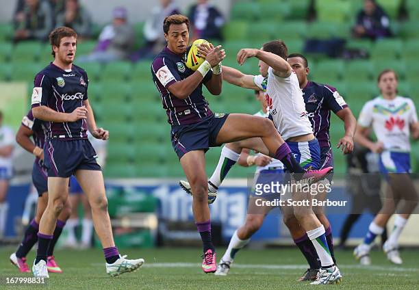 Denny Solomona of the Storm takes a high ball during the round eight Holden Cup match between the Melbourne Storm and the Canberra Raiders at AAMI...