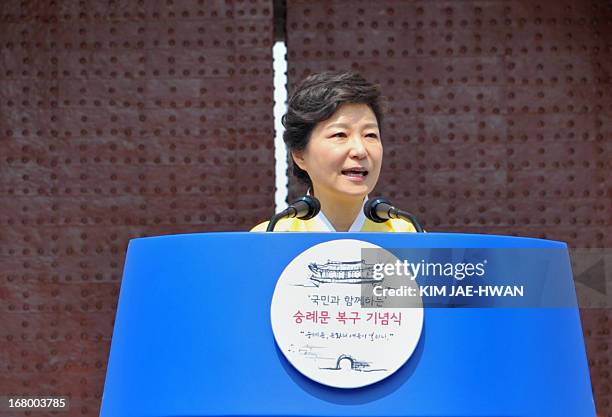 South Korean President Park Geun-Hye delivers a speech during the re-opening ceremony of Namdaemun gate in Seoul on May 4, 2013. South Korea on May 4...