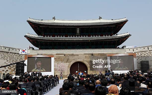 South Korean President Park Geun-hye delivers a speech during the re-opening ceremony of Namdaemun gate in Seoul on May 4, 2013. South Korea on May 4...