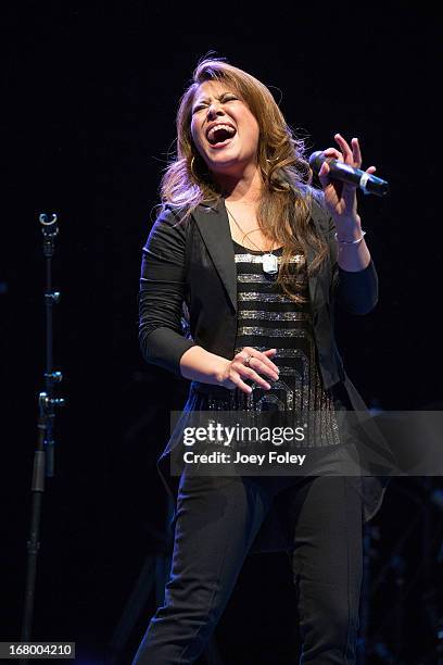 Singer Angie Johnson performs onstage during the Julep Ball 2013 during the 139th Kentucky Derby at KFC YUM! Center on May 3, 2013 in Louisville,...