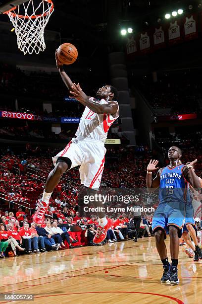Patrick Beverley of the Houston Rockets drives to the basket on a fast break against the Oklahoma City Thunder in Game Six of the Western Conference...