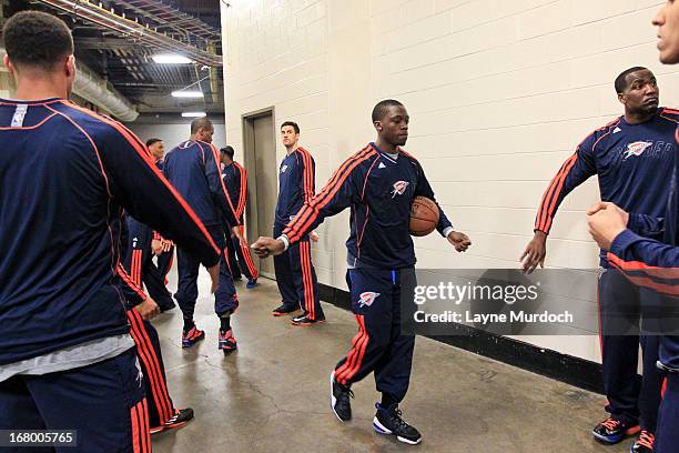 Reggie Jackson of the Oklahoma City Thunder greets teammates before playing against the Houston Rockets in Game Six of the Western Conference...