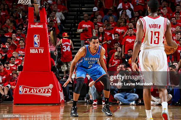 Thabo Sefolosha of the Oklahoma City Thunder plays defense against James Harden of the Houston Rockets in Game Six of the Western Conference...