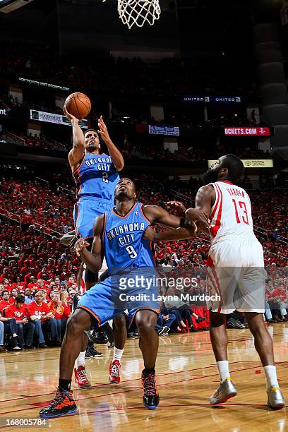 Thabo Sefolosha of the Oklahoma City Thunder shoots a layup against the Houston Rockets in Game Six of the Western Conference Quarterfinals during...
