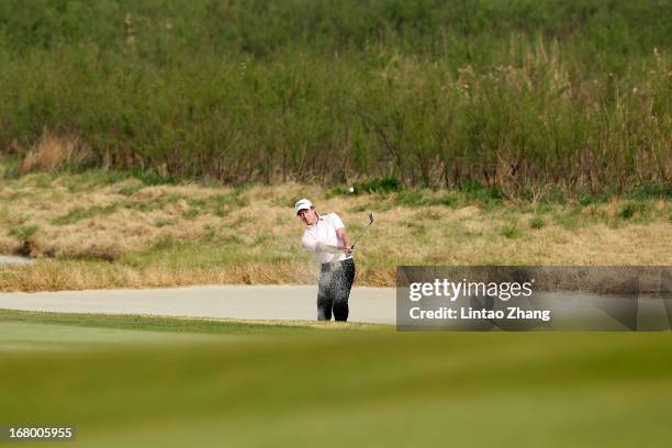 Brett Rumford of Australia plays a shot during the third day of the Volvo China Open at Binhai Lake Golf Course on May 4, 2013 in Tianjin, China.
