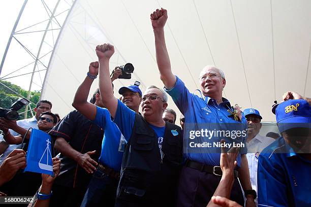 Malaysia's Prime Minister and Barisan Nasional chairman Najib Razak greets supporters during an election rally to address young parliamentary...