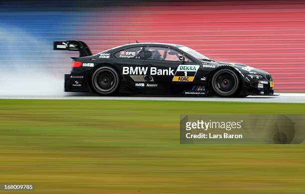 Bruno Spengler of Canada and BMW Team Schnitzer drives during the training session for the first round of the DTM 2013 German Touring Car...