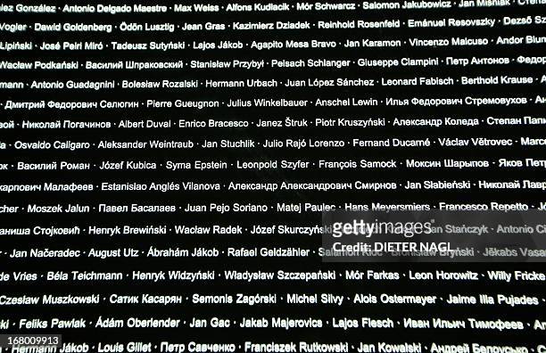 Glass panel of th "Room of Names" at the visitor centre exhibition is pictured at the former concentration camp Mauthausen on May 2, 2013 in...