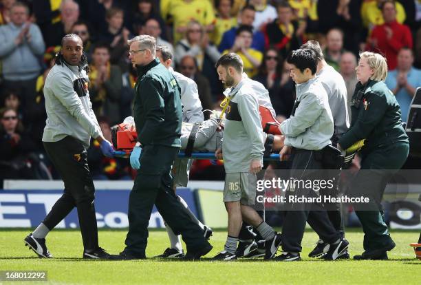 Injured Watford goalkeeper Jonathan Bond is stretchered off during the npower Championship match between Watford and Leeds United at Vicarage Road on...